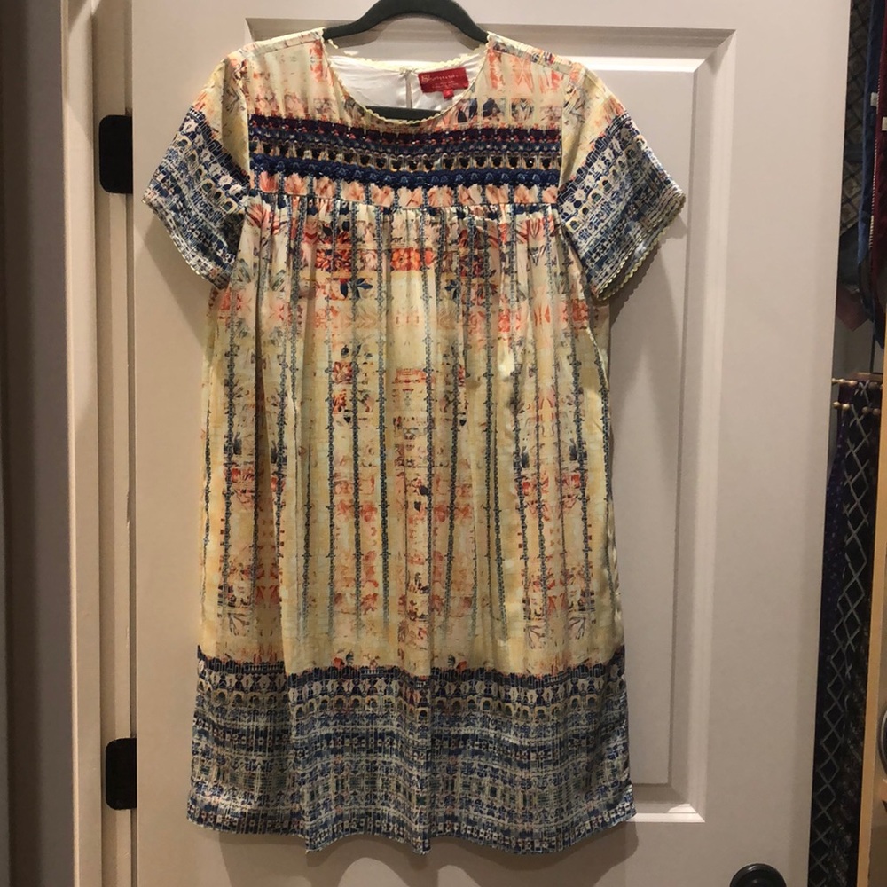 Woman’s yellow, blue & orange dress!